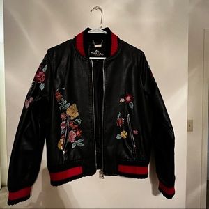 Black synthetic leader with stamps